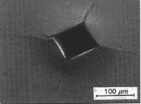 Optical photo of Vickers indentation in silicon nitride.